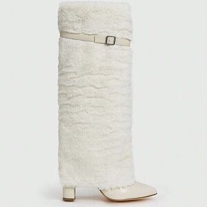 Cream faux fur knee high boots with buckle detail